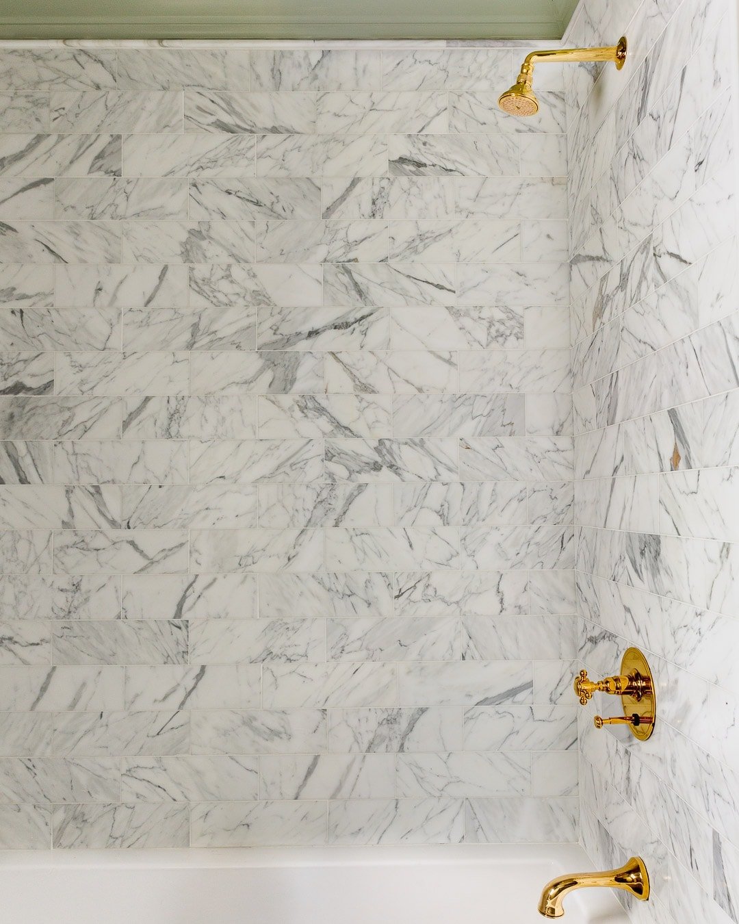A-GLASS-OF-BOVINO-SHOWER-CALACATTA-MARBLE